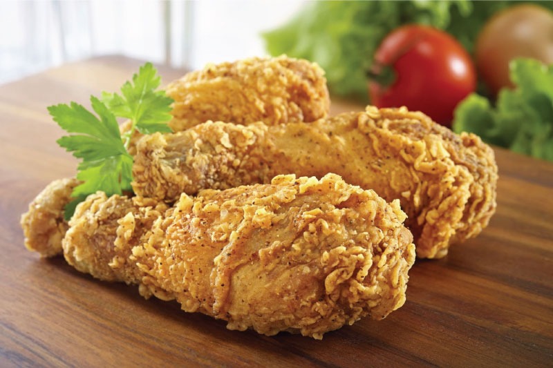 Golden brown chicken legs with a crunchy coating and juicy meat